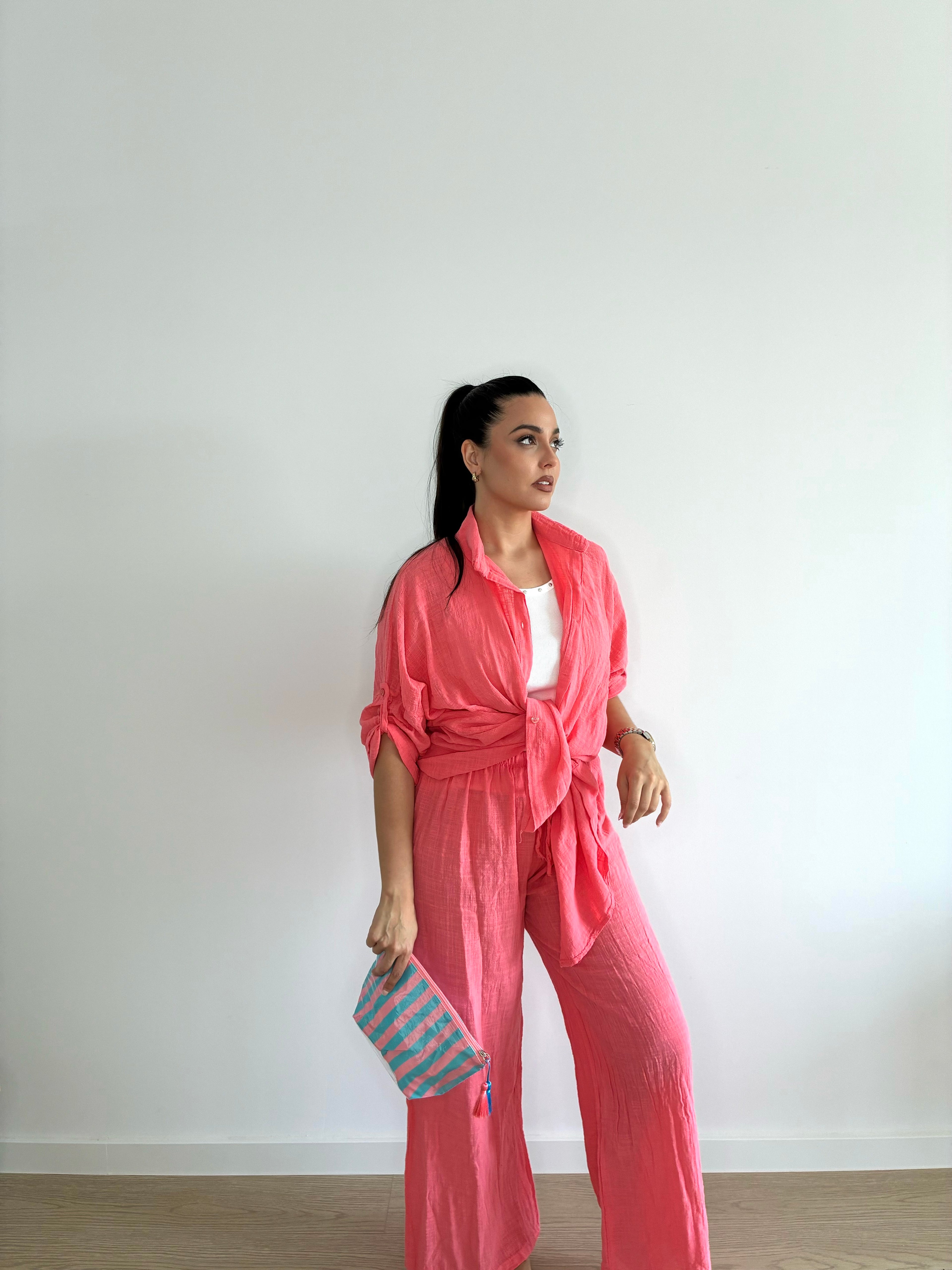 Bolso neceser de rayas con pompón